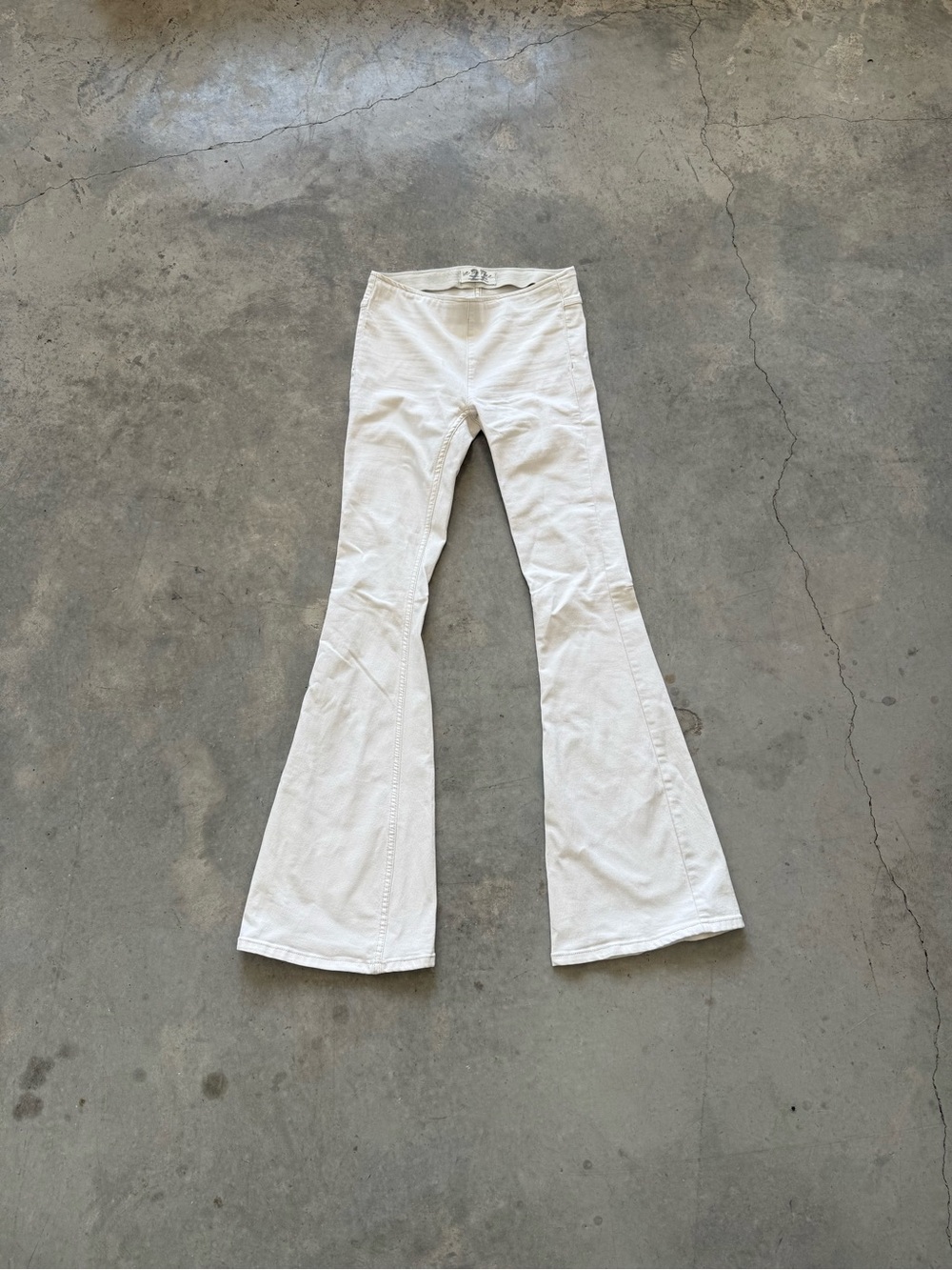 We The Free Cream Flare Leg Jeans